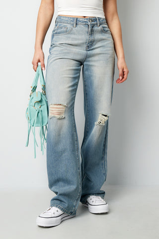 Jeans met scheuren