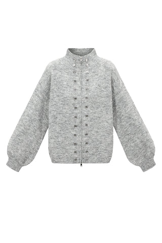 Gebreide trui met ritssluiting en knoopdetails