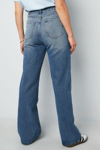 Denim jeans slanted zipper